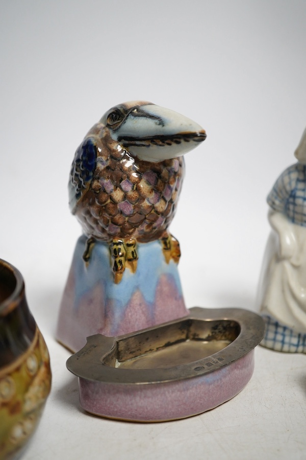 A Doulton Lambeth Kookaburra bibelot with silver tray, a novelty frog in a kayak, a fish jar and figure of a maid, Kookaburra 11cm high. Condition - good